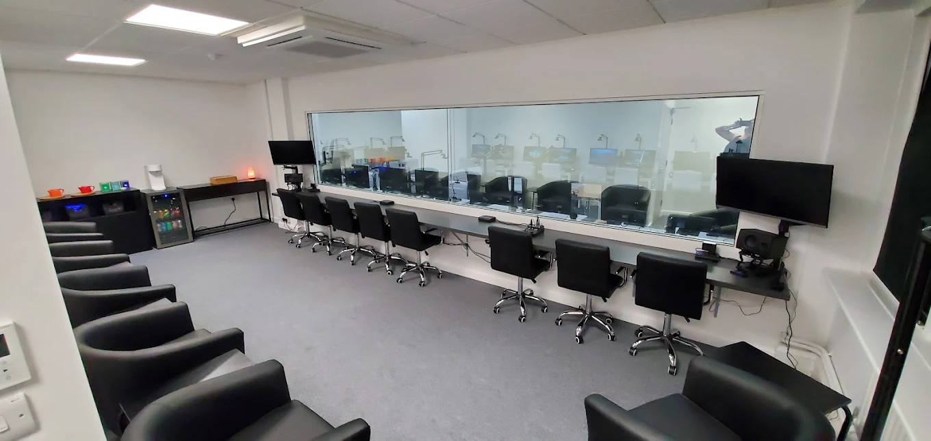 Modern VGM focus group suite with one-way mirror viewing room